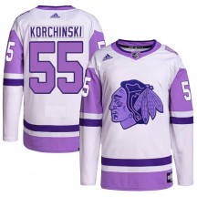 Youth Adidas Chicago Blackhawks Kevin Korchinski White/Purple Hockey Fights Cancer Primegreen Jersey - Authentic