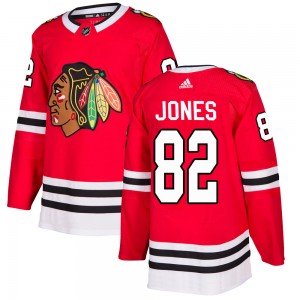 Men's Adidas Chicago Blackhawks Caleb Jones Red Home Jersey - Authentic